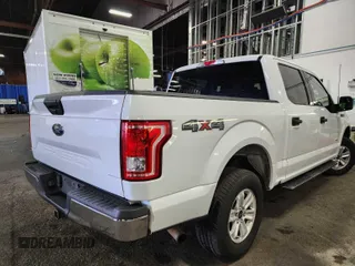 2015 Ford F-150 XLT with VIN 1FTEW1EG3FFA90167, listed as a IAAI auction lot 42792760 with 142,559 mi miles and . Bid and sale history available at DreamBid. Image 14.