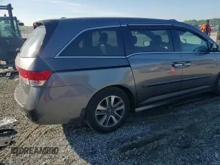 2014 Honda Odyssey Touring z VIN 5FNRL5H90EB007862, wystawiony jako Copart lot #60470005 z przebiegiem 135 686 mil mil oraz Czysty tytuł • Clean title. Historia ofert i sprzedaży dostępna na DreamBid. Obrazek 14.