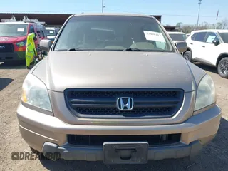 2004 Honda Pilot EX with VIN 2HKYF18464H599512, listed as a IAAI auction lot 42098213 with 224,054 mi miles and . Bid and sale history available at DreamBid. Image 6.