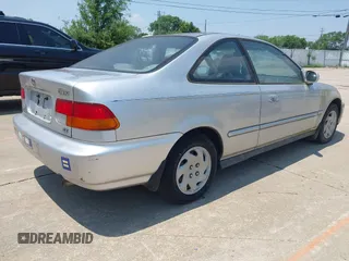 1997 Honda Civic EX z VIN 1HGEJ8146VL015936, wystawiony jako IAAI lot #42461577 z przebiegiem 267 563 mil mil oraz . Historia ofert i sprzedaży dostępna na DreamBid. Obrazek 4.