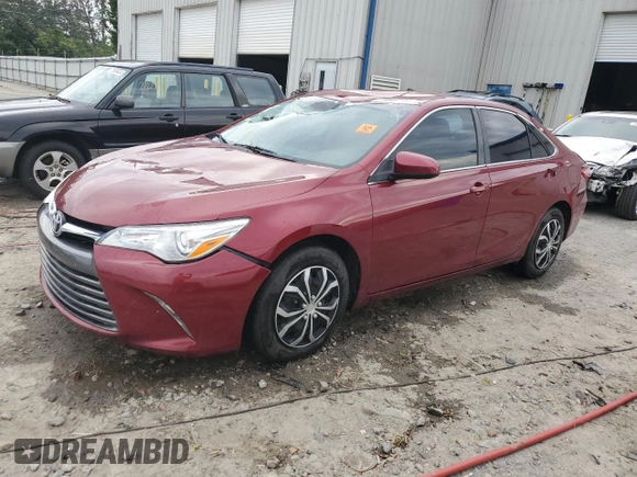 2015 Toyota Camry XLE with VIN 4T1BF1FK0FU894097, listed as a Copart auction lot 73964744 with 210,289 mi miles and Salvage Title. Bid and sale history available at DreamBid. Image 1.