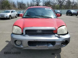 2003 Hyundai Santa Fe GLS z VIN KM8SC13D83U498381, wystawiony jako Copart lot #55393305 z przebiegiem 140 852 mil mil oraz Szkoda całkowita • Salvage title. Historia ofert i sprzedaży dostępna na DreamBid. Obrazek 5.