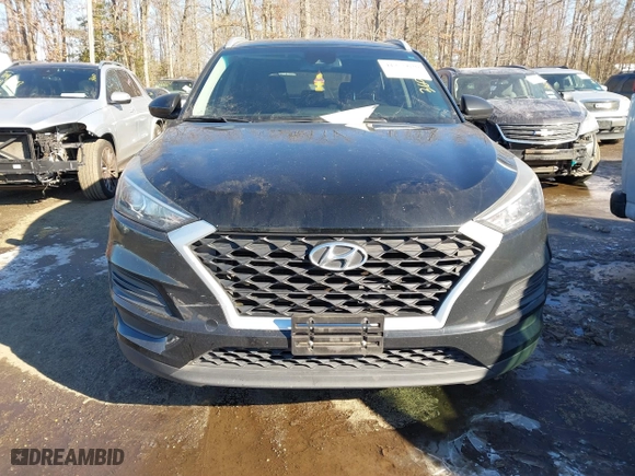 2019 Hyundai Tucson Value with VIN KM8J33A4XKU979791, listed as a IAAI auction lot 41255630 with 90,807 mi miles. Bid and sale history available at carsss.com. Image 12.