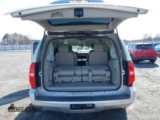 2013 Chevrolet Tahoe LT z VIN 1GNSCBE06DR106384, wystawiony jako IAAI lot #41574274 z przebiegiem 168 655 mil mil oraz . Historia ofert i sprzedaży dostępna na DreamBid. Obrazek 8.