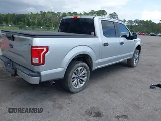 2017 Ford F-150 XL with VIN 1FTEW1EP3HFC11699, listed as a IAAI auction lot 42450046 with 106,664 mi miles and . Bid and sale history available at DreamBid. Image 4.
