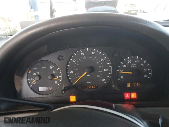 2000 Mercedes-Benz M-Class with VIN 4JGAB54E1YA193102, listed as a Copart auction lot 74294404 with 202,107 mi miles and Salvage Title. Bid and sale history available at carsss.com. Image 9.