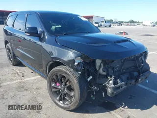 2020 Dodge Durango R/T with VIN 1C4SDHCT7LC285798, listed as a IAAI auction lot 42316447 with 86,344 mi miles and . Bid and sale history available at DreamBid. Image 1.