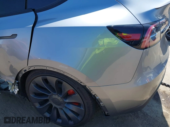 2024 Tesla Model Y Performance with VIN 7SAYGDEF9RA299036, listed as a IAAI auction lot 42140788 with 14,844 mi miles and . Bid and sale history available at DreamBid. Image 22.