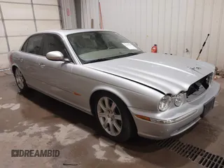 2004 Jaguar XJ with VIN SAJWA71C04SG33993, listed as a IAAI auction lot 41193040 with 79,944 mi miles. Bid and sale history available at carsss.com. Image 1.