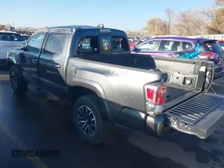 2023 Toyota Tacoma SR with VIN 3TMCZ5AN2PM553928, listed as a IAAI auction lot 40999044 with 9,210 mi miles and . Bid and sale history available at DreamBid. Image 3.