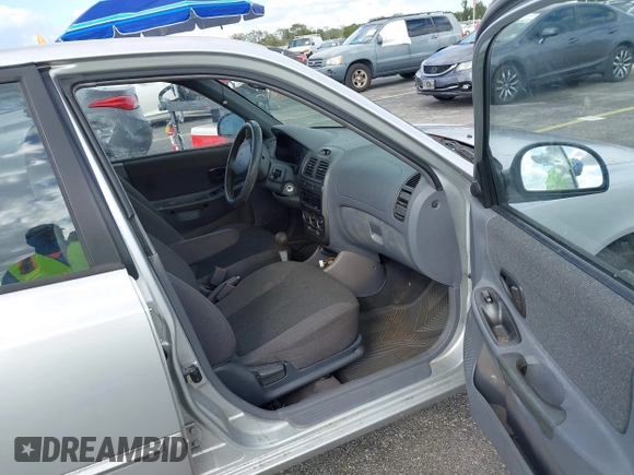 2002 Hyundai Accent GL with VIN KMHCG45C52U378454, listed as a IAAI auction lot 41418653 with 173,564 mi miles. Bid and sale history available at carsss.com. Image 5.