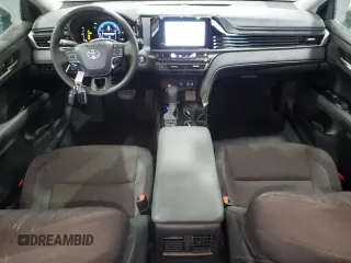 2025 Toyota Camry LE z VIN 4T1DAACKXSU004632, wystawiony jako Copart lot #57882405 z przebiegiem 20 824 mil mil oraz Szkoda całkowita • Salvage title. Historia ofert i sprzedaży dostępna na DreamBid. Obrazek 8.