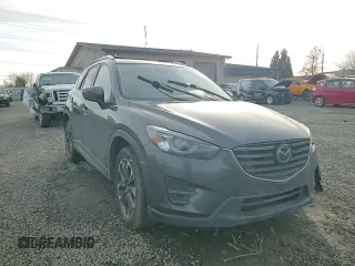 2016 Mazda CX-5 Grand Touring with VIN JM3KE4DY0G0876540, listed as a Copart auction lot 42132815 with 110,158 mi miles and Salvage Title. Bid and sale history available at DreamBid. Image 12.