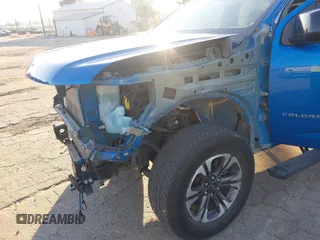 2021 Chevrolet Colorado 4WD Z71 with VIN 1GCGTDEN6M1264115, listed as a IAAI auction lot 41667276 with 31,304 mi miles and . Bid and sale history available at DreamBid. Image 6.