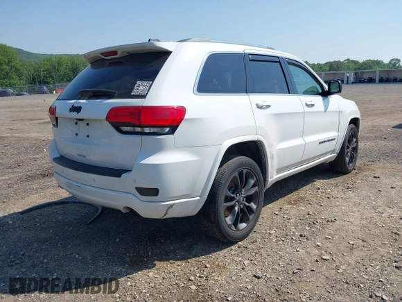 2018 Jeep Grand Cherokee Altitude with VIN 1C4RJFAG9JC162874, listed as a IAAI auction lot 42396844 with 102,321 mi miles and . Bid and sale history available at DreamBid. Image 4.
