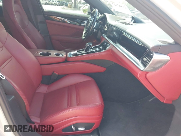 2018 Porsche Panamera 4 E-Hybrid z VIN WP0AE2A7XJL174378, wystawiony jako IAAI lot #42303125 z przebiegiem 35 636 mil mil oraz . Historia ofert i sprzedaży dostępna na DreamBid. Obrazek 5.