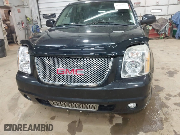 2012 GMC Yukon XL Denali with VIN 1GKS2MEF9CR323393, listed as a IAAI auction lot 41983097 with Not Provided miles. Bid and sale history available at carsss.com. Image 12.