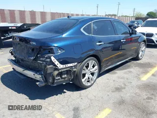 2015 Infiniti Q70 with VIN JN1BY1PP8FM601834, listed as a IAAI auction lot 42028330 with 106,285 mi miles and . Bid and sale history available at DreamBid. Image 4.