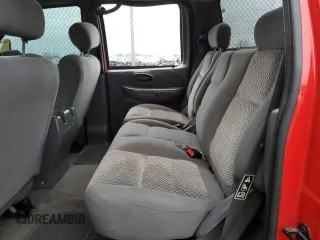 2003 Ford F-150 XLT with VIN 1FTRW07643KA38307, listed as a Copart auction lot 51496915 with 112,110 mi miles and Salvage Title. Bid and sale history available at carsss.com. Image 10.