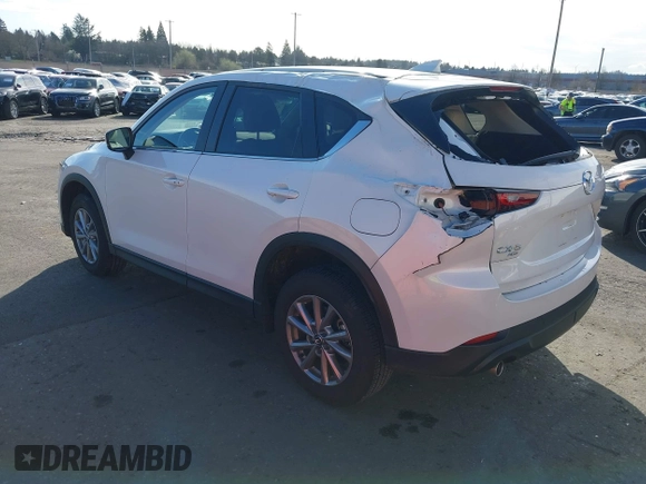 2023 Mazda CX-5 2.5 S Select Package with VIN JM3KFBBM9P0142478, listed as a IAAI auction lot 41724596 with 9,518 mi miles. Bid and sale history available at carsss.com. Image 3.