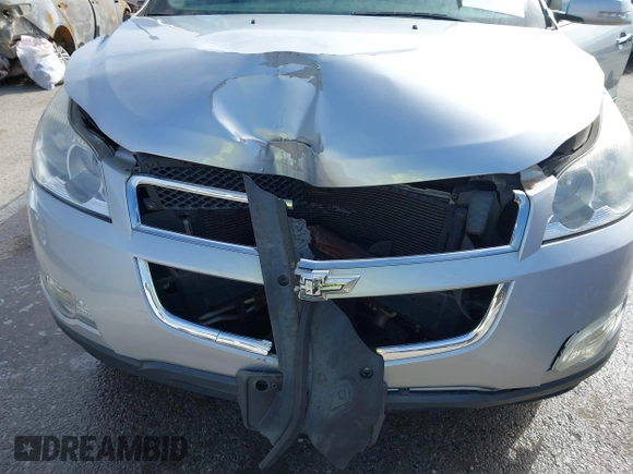 2012 Chevrolet Traverse 1LT with VIN 1GNKRGED5CJ204012, listed as a IAAI auction lot 41806346 with 115,901 mi miles and . Bid and sale history available at DreamBid. Image 6.