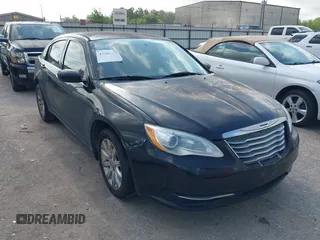 2014 Chrysler 200 Touring with VIN 1C3CCBBBXEN153420, listed as a IAAI auction lot 42084600 with 215,209 mi miles. Bid and sale history available at carsss.com. Image 1.
