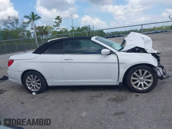 2012 Chrysler 200 Touring with VIN 1C3BCBEBXCN215502, listed as a IAAI auction lot 41913232 with Not Provided miles and . Bid and sale history available at carsss.com. Image 13.