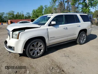 2015 GMC Yukon Denali z VIN 1GKS2CKJ1FR204308, wystawiony jako Copart lot #53678995 z przebiegiem 156 843 mil mil oraz Szkoda całkowita • Salvage title. Historia ofert i sprzedaży dostępna na DreamBid. Obrazek 1.