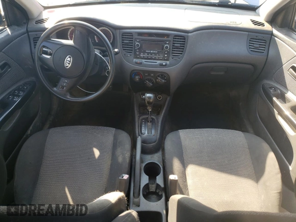 2011 Kia Rio with VIN KNADH4B32B6915275, listed as a Copart auction lot 71546484 with 297,998 mi miles and Salvage Title. Bid and sale history available at DreamBid. Image 8.