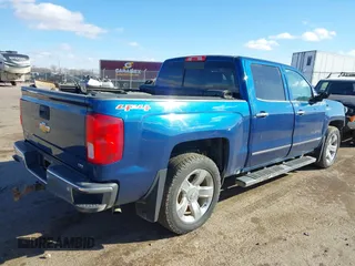 2017 Chevrolet Silverado 1500 LTZ with VIN 3GCUKSEC4HG371972, listed as a IAAI auction lot 41696294 with 123,297 mi miles and . Bid and sale history available at DreamBid. Image 4.