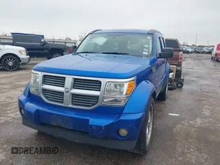 2008 Dodge Nitro SLT with VIN 1D8GU58K58W177983, listed as a IAAI auction lot 41447138 with 184,004 mi miles. Bid and sale history available at carsss.com. Image 2.