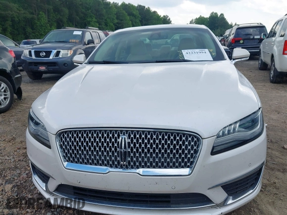 2019 Lincoln MKZ Reserve II z VIN 3LN6L5E94KR607412, wystawiony jako IAAI lot #42231994 z przebiegiem 54 812 mil mil oraz . Historia ofert i sprzedaży dostępna na DreamBid. Obrazek 12.
