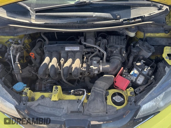 2015 Honda Fit EX-L z VIN 3HGGK5H83FM787047, wystawiony jako Copart lot #77851614 z przebiegiem 270 010 mil mil oraz Czysty tytuł • Clean title. Historia ofert i sprzedaży dostępna na DreamBid. Obrazek 7.