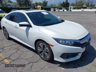 2018 Honda Civic EX-L z VIN JHMFC1F78JX036294, wystawiony jako IAAI lot #42126248 z przebiegiem 72 214 mil mil oraz . Historia ofert i sprzedaży dostępna na DreamBid. Obrazek 1.