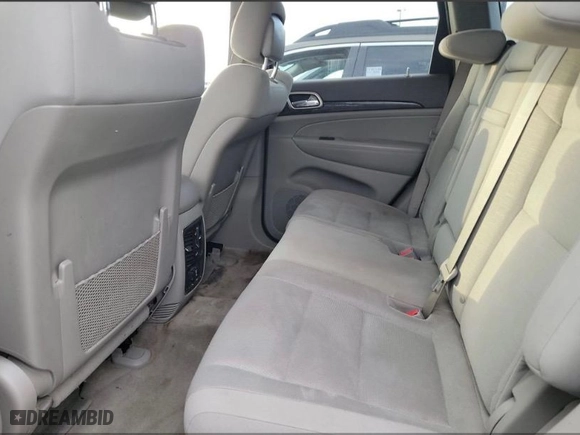 2011 Jeep Grand Cherokee Laredo with VIN 1J4RR4GG1BC669834, listed as a IAAI auction lot 42019804 with 173,943 mi miles. Bid and sale history available at carsss.com. Image 7.