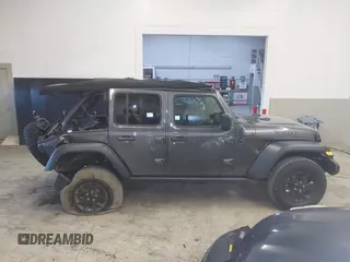 2021 Jeep Wrangler Unlimited Sport S with VIN 1C4HJXDN8MW744768, listed as a IAAI auction lot 41894327 with 47,826 mi miles and . Bid and sale history available at DreamBid. Image 13.