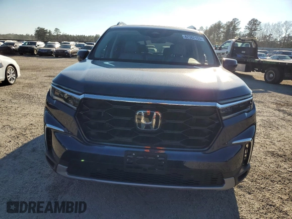 2023 Honda Pilot Touring with VIN 5FNYG2H73PB007631, listed as a Copart auction lot 82382153 with 6,050 mi miles. Bid and sale history available at carsss.com. Image 5.