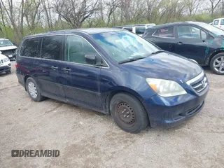 2007 Honda Odyssey LX with VIN 5FNRL382X7B130773, listed as a IAAI auction lot 41981290 with 282,786 mi miles. Bid and sale history available at carsss.com. Image 1.
