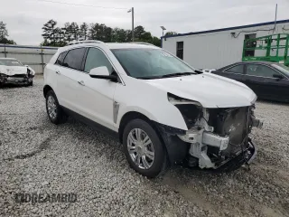 2015 Cadillac SRX Luxury Collection with VIN 3GYFNBE32FS581541, listed as a Copart auction lot 54134415 with 154,372 mi miles and Salvage Title. Bid and sale history available at DreamBid. Image 4.
