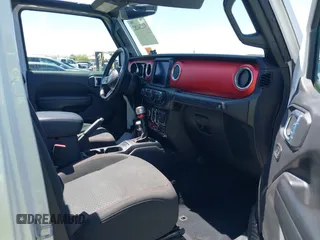 2021 Jeep Wrangler Unlimited Rubicon with VIN 1C4HJXFGXMW850556, listed as a IAAI auction lot 42234282 with 80,834 mi miles and . Bid and sale history available at DreamBid. Image 5.