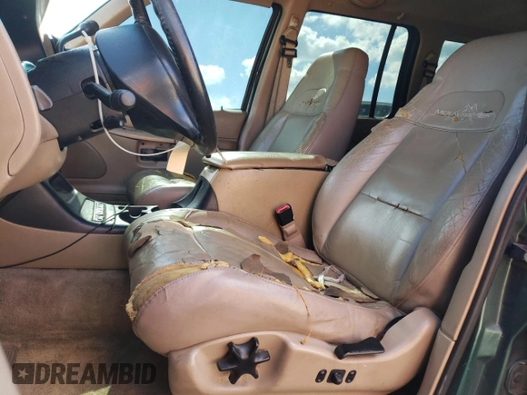 2000 Mercury Mountaineer z VIN 4M2ZU66P1YUJ05468, wystawiony jako Copart lot #75682513 z przebiegiem 211 748 mil mil oraz Szkoda całkowita • Salvage title. Historia ofert i sprzedaży dostępna na DreamBid. Obrazek 7.