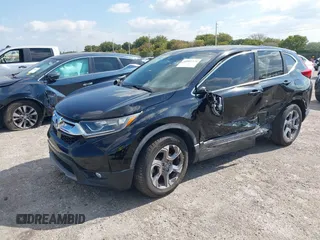 2017 Honda CR-V EX-L with VIN 7FARW1H80HE004721, listed as a IAAI auction lot 42063324 with 33,226 mi miles. Bid and sale history available at carsss.com. Image 2.