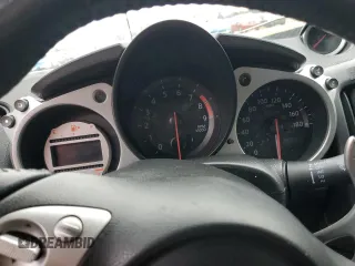 2010 Nissan 370Z z VIN JN1AZ4FH0AM301315, wystawiony jako Copart lot #86204894 z przebiegiem Nie podano mil oraz Szkody całkowita. Historia ofert i sprzedaży dostępna na DreamBid. Obrazek 9.