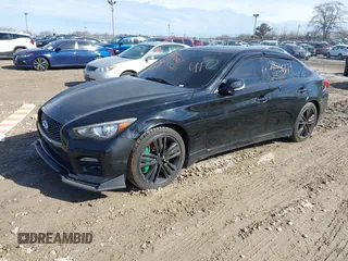 2015 Infiniti Q50 Premium z VIN JN1BV7AR3FM408819, wystawiony jako IAAI lot #41702328 z przebiegiem 162 220 mil mil oraz . Historia ofert i sprzedaży dostępna na DreamBid. Obrazek 21.