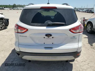 2015 Ford Escape SE with VIN 1FMCU0GXXFUB61487, listed as a Copart auction lot 52116665 with 115,921 mi miles and Salvage Title. Bid and sale history available at DreamBid. Image 6.