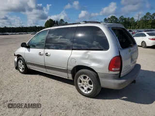 2000 Dodge Caravan SE with VIN 2B4GP45G0YR525310, listed as a Copart auction lot 69596394 with 299,957 mi miles and Salvage Title. Bid and sale history available at carsss.com. Image 2.