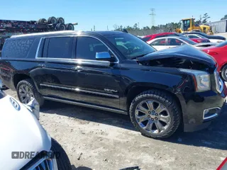 2016 GMC Yukon XL Denali with VIN 1GKS1HKJ5GR435925, listed as a IAAI auction lot 41727259 with 137,098 mi miles. Bid and sale history available at carsss.com. Image 1.