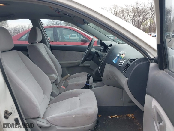 2007 Kia Spectra EX with VIN KNAFE121875393392, listed as a IAAI auction lot 41893653 with 158,913 mi miles. Bid and sale history available at carsss.com. Image 5.