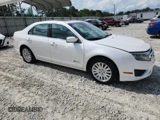 2010 Ford Fusion Hybrid z VIN 3FADP0L39AR152224, wystawiony jako Copart lot #60549615 z przebiegiem 118 939 mil mil oraz Szkoda całkowita • Salvage title. Historia ofert i sprzedaży dostępna na DreamBid. Obrazek 4.