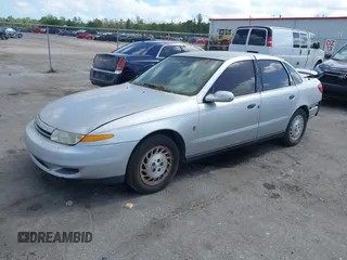 2002 Saturn LS z VIN 1G8JS54F92Y595651, wystawiony jako IAAI lot #41569902 z przebiegiem Nie podano mil oraz . Historia ofert i sprzedaży dostępna na DreamBid. Obrazek 2.